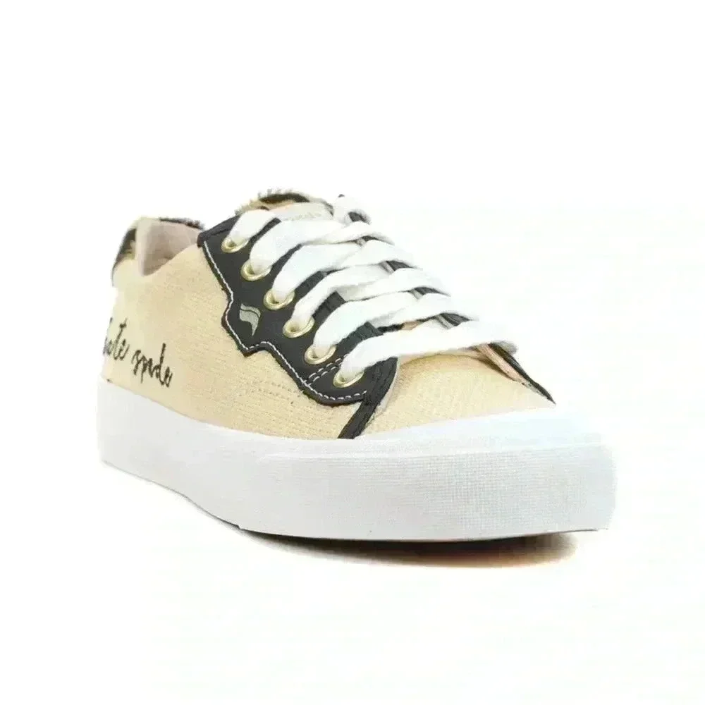 Keds beige canvas sneakers with black trim and leopard heel